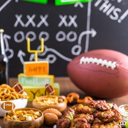 a table with food and a football