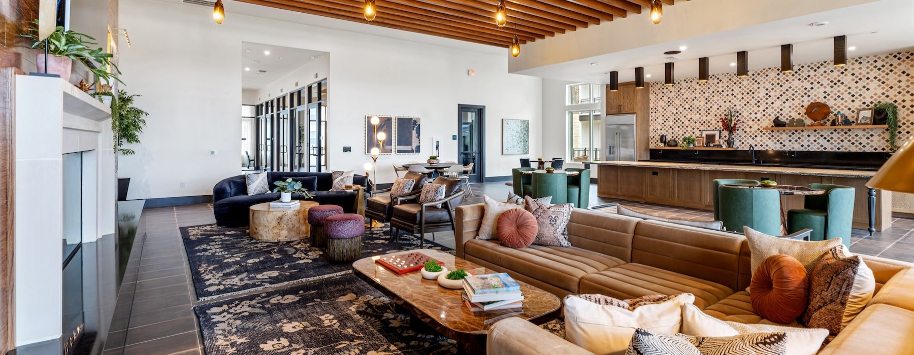 a clubroom with a couch and a tv