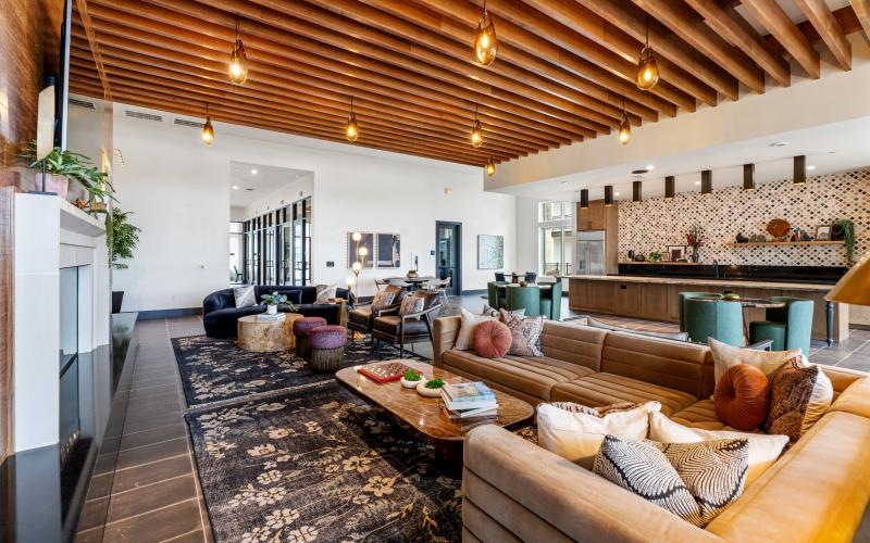 a clubroom with a couch and a tv